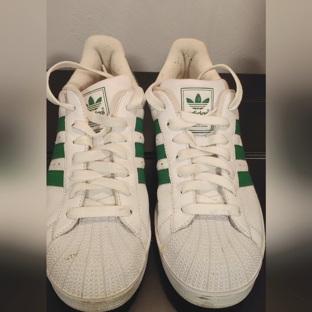 Original Adidas rubber tow white with green strips womans shoes
